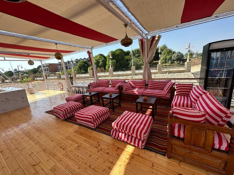 Yalla Bina Dahabiya Nile Cruise sailing on the Nile River between Luxor and Aswan