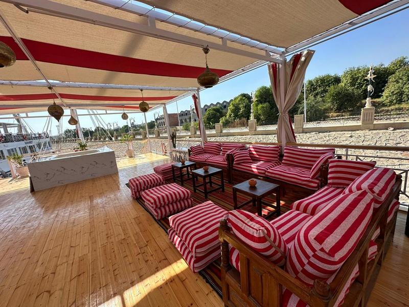 Yalla Bina Dahabiya Nile Cruise sailing on the Nile River between Luxor and Aswan